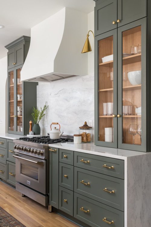 Green Kitchen with slab backsplash.