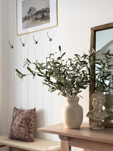 olive stems in vase