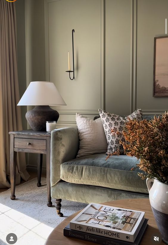 Green living room with molding