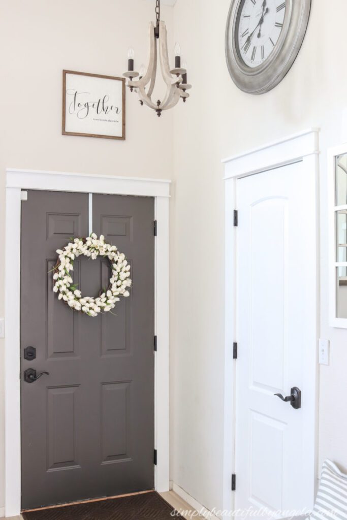 white tulip wreath om black front door