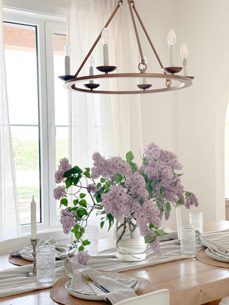 Fresh lilacs on Mother's Day table setting