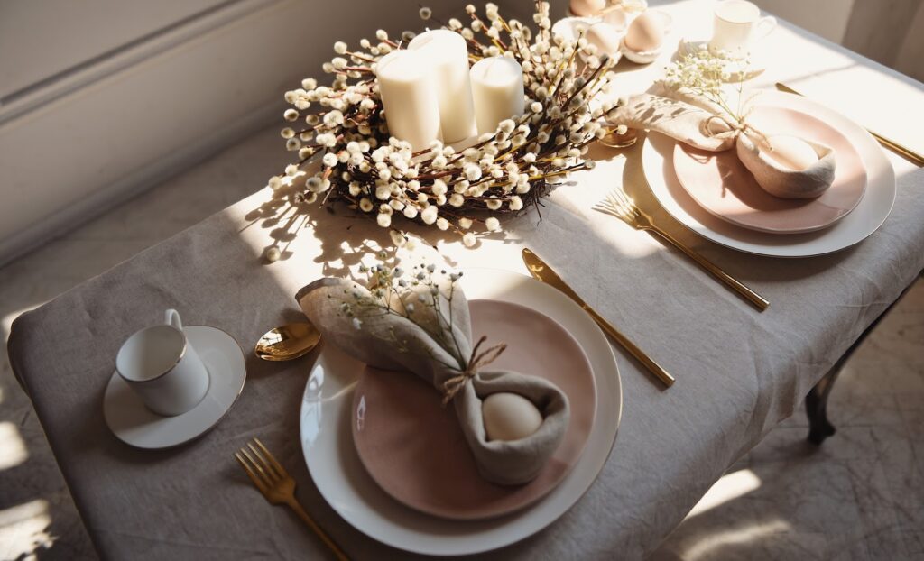 Blush easter table setting with napkins with eggs