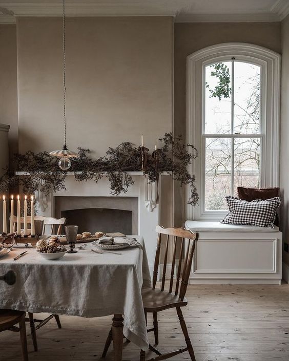 English cottage dining room by fireplace