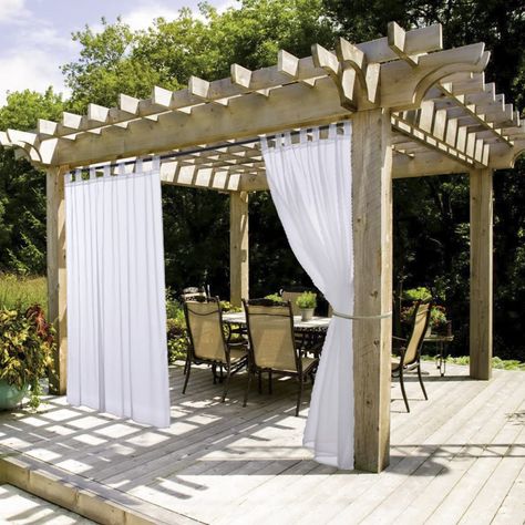Pergola with curtains for patio privacy