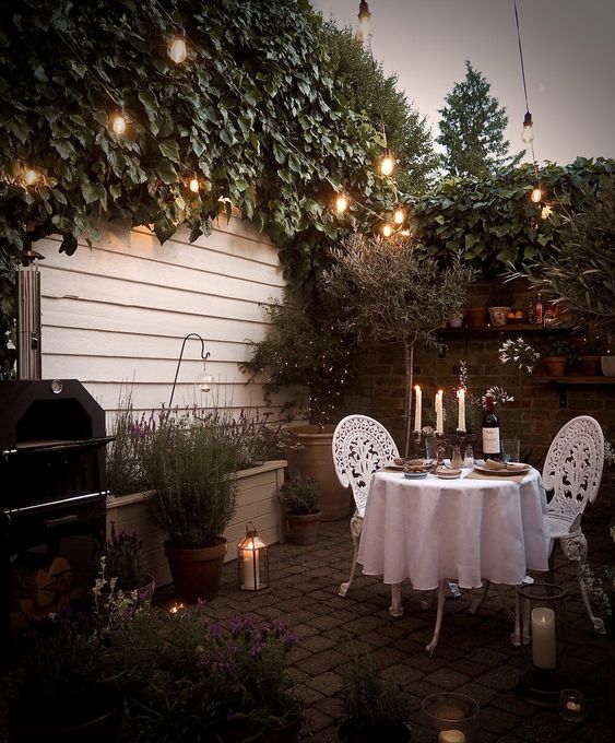 romantic courtyard garden with string lighting