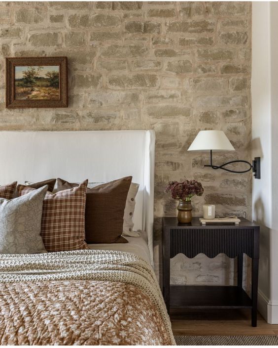 Stone wall in modern bedroom
